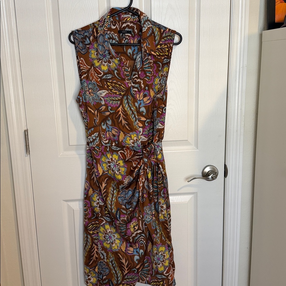 DREW Brown Floral wrap Midi Dress with a base in brown with floral designs